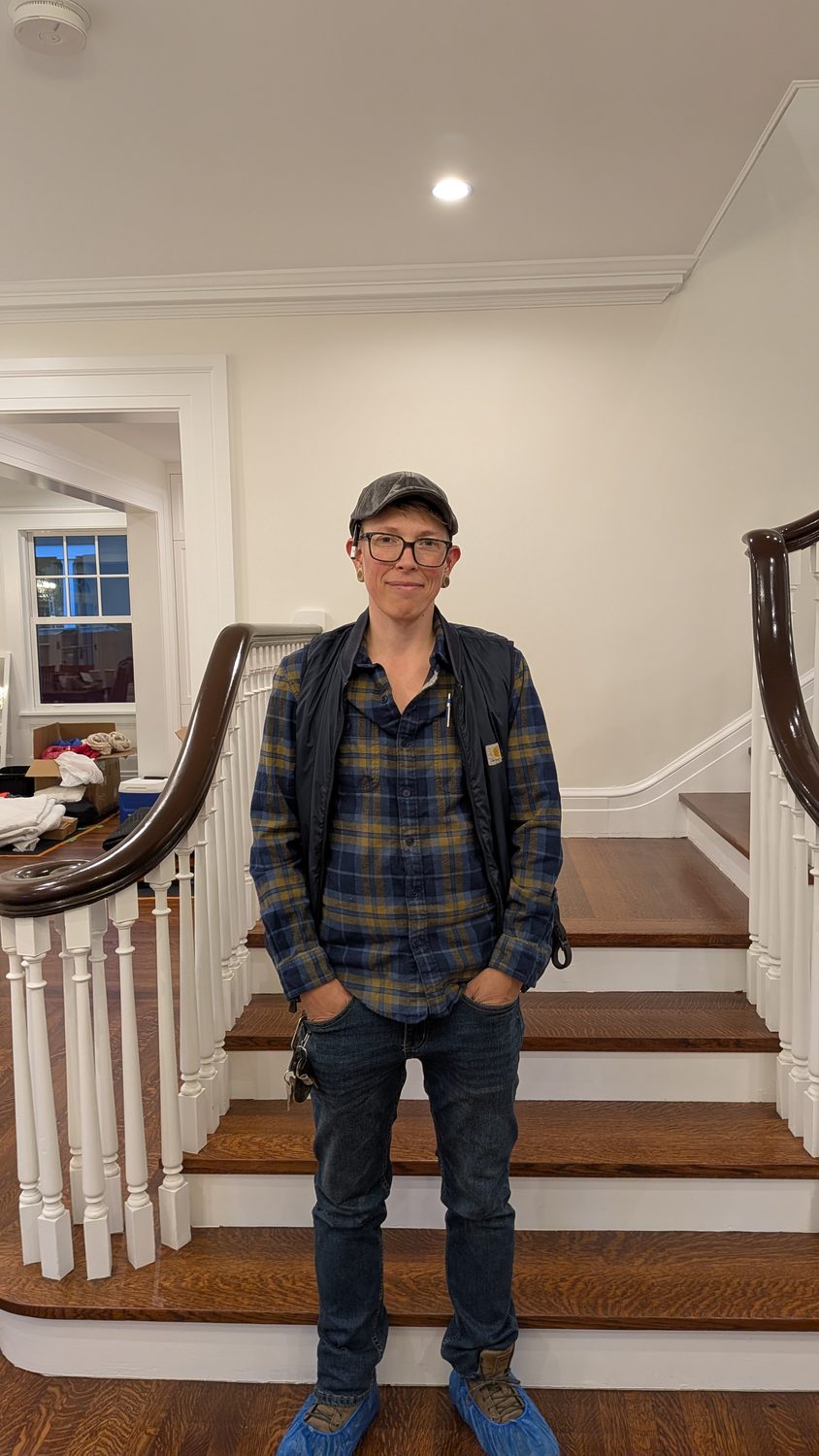 The carpenter behind The Robbers Roost, on-site with a custom curved staircase